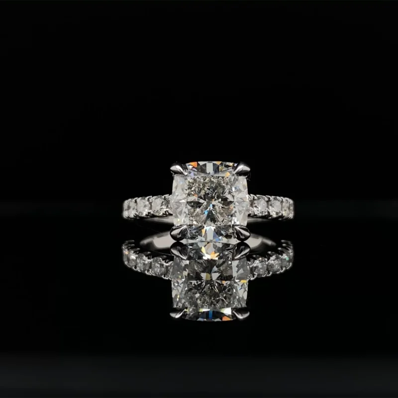 Gorgeous 3.00 Carat E/VS1 Cushion Cut With Round Side Stones