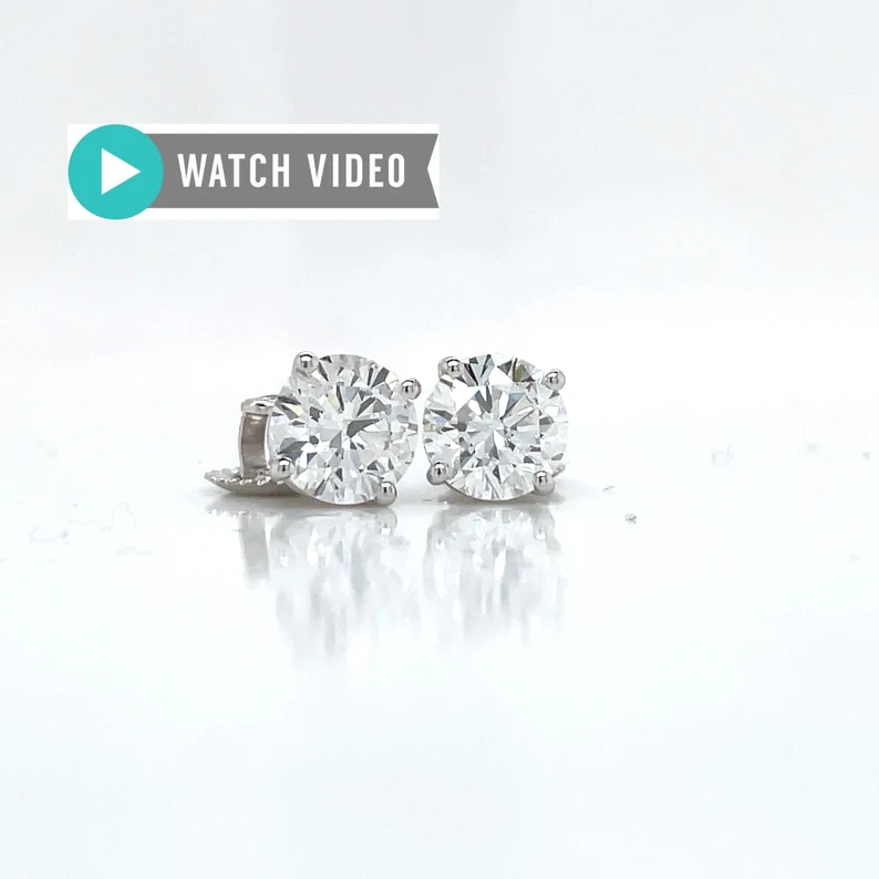 1.28 Carat Total Weight E Color VVS Clarity IGI Certified Round Brilliant Cut Lab Grown Diamond Studs 4 Prong Basket 14kt White Gold